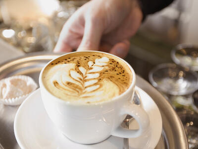 a cup of coffee with latte art