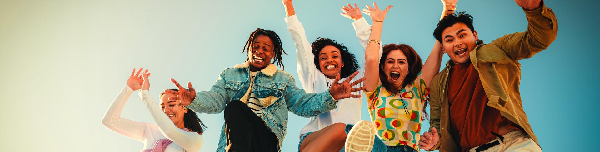 Colleagues jumping in the air